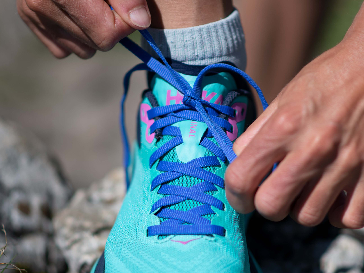 Mathilde tying up her Zinal shoelaces