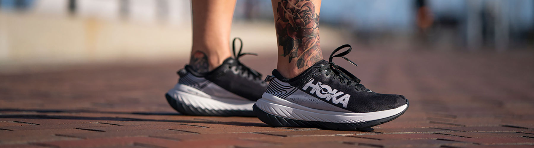 A picture of a man's feet wearing the black Carbon X