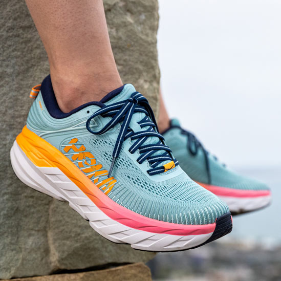 Close up of someone wearing HOKA Bondi 7 shoes