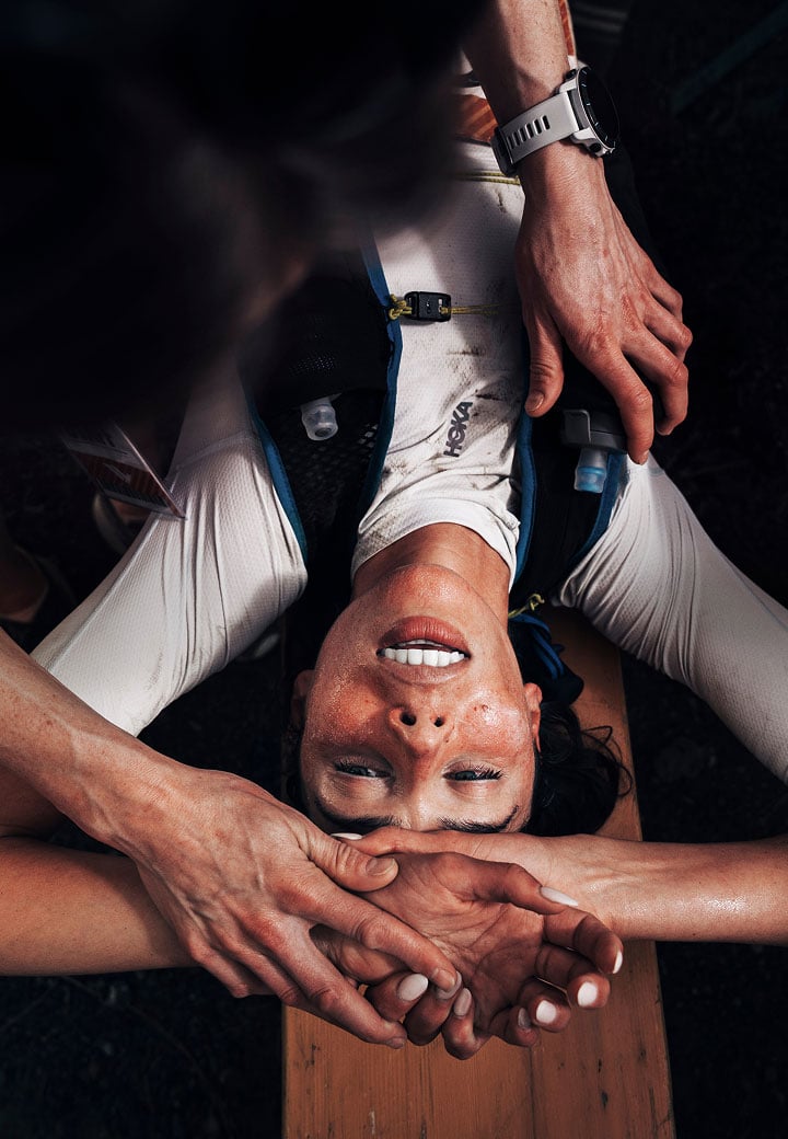 HOKA runner laying down after a grueling race.